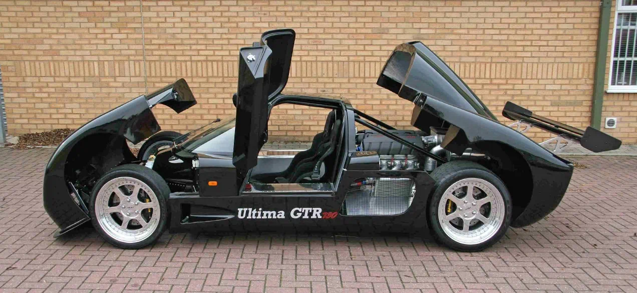 black Ultima GTR with fibreglass panels open, manufactured by Quantum