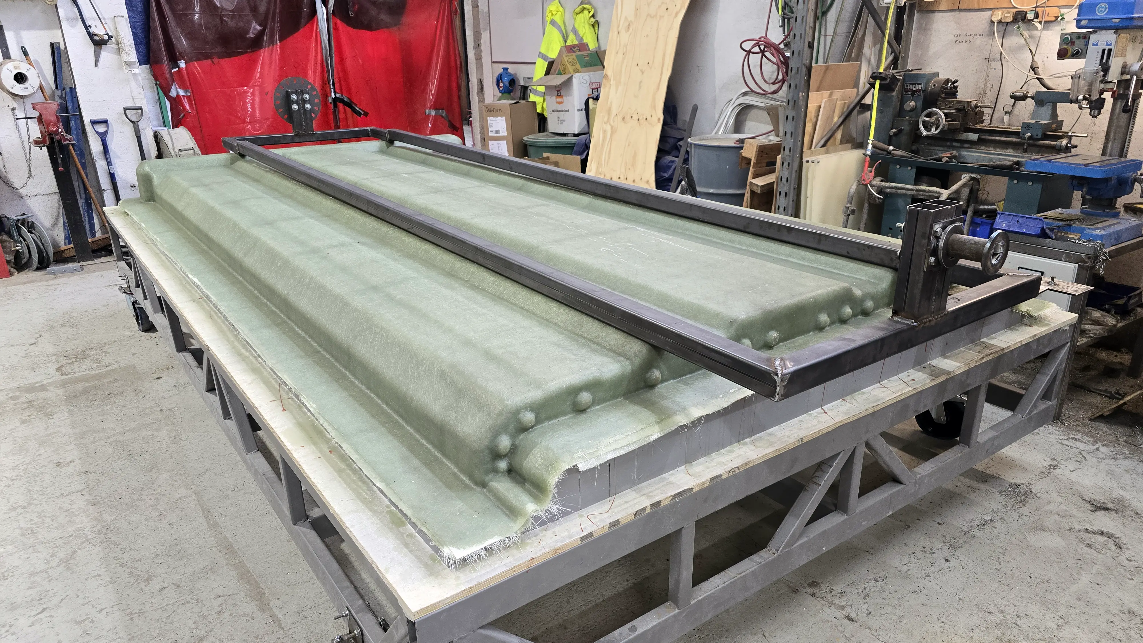 A bespoke jig to support a large fibreglass component